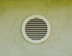 exhaust air cover with old wall.